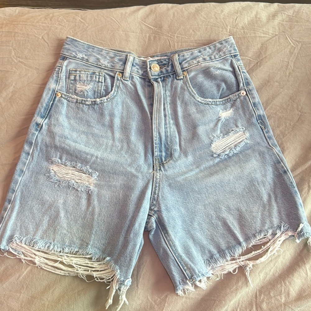 Stradivarius Bermuda style ripped shorts